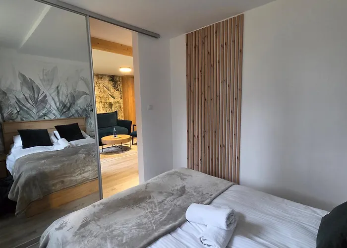 W Sercu Parku - Dabrowka Cieplce Apartment *